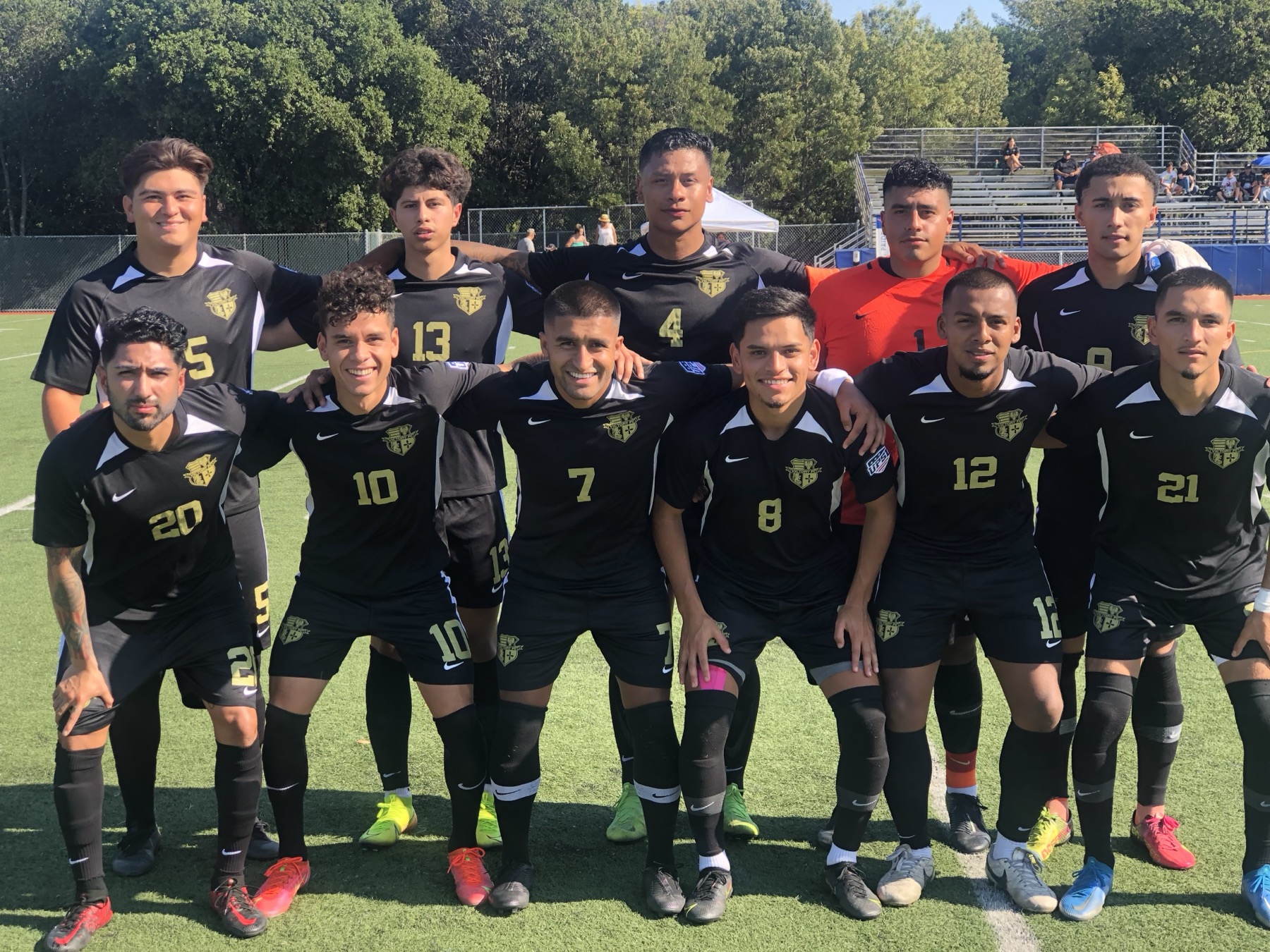 Cal Victory FC team photo on the field